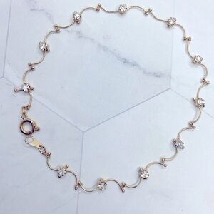 Anklet wave design with sparkly rhinestones gold tone